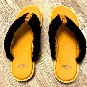 Brand new Ugg flip flops with black shearling